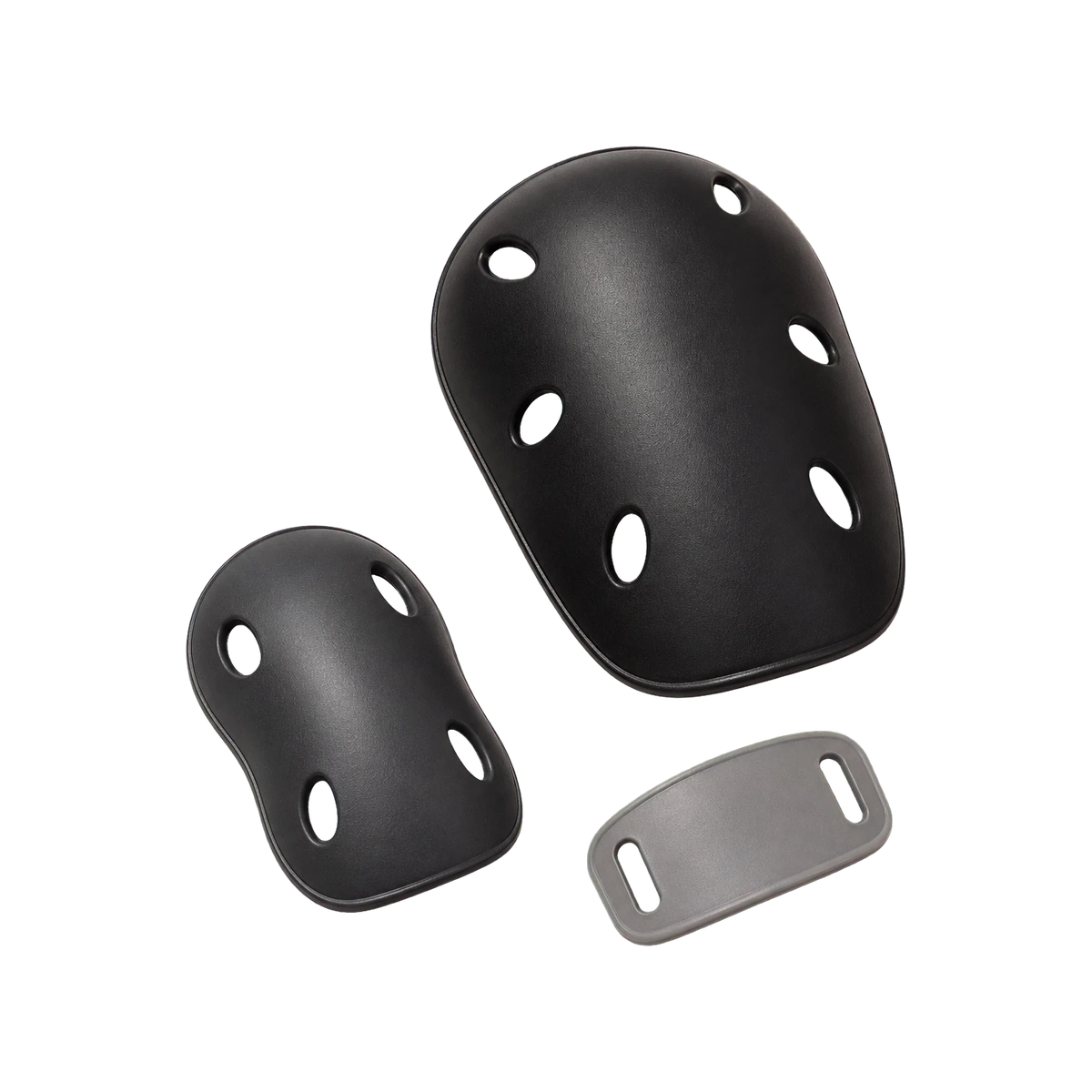 Protective gear part samples: injection-molded knee and elbow pad shells and accessory plate