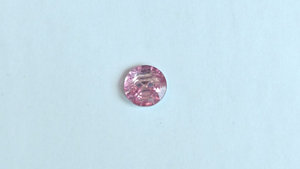 Faceted two-hole button product photo