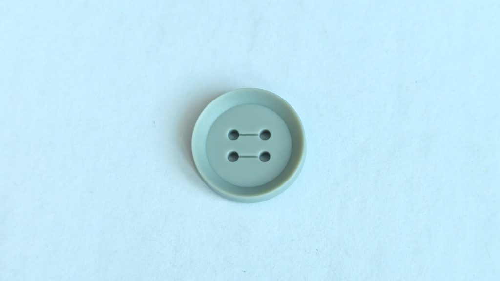 Grooved four-hole button appearance image