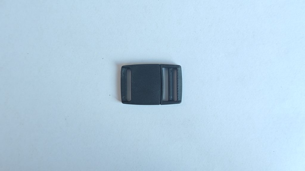 Side release buckle with rectangular buckle body and back protrusions, product photo 1