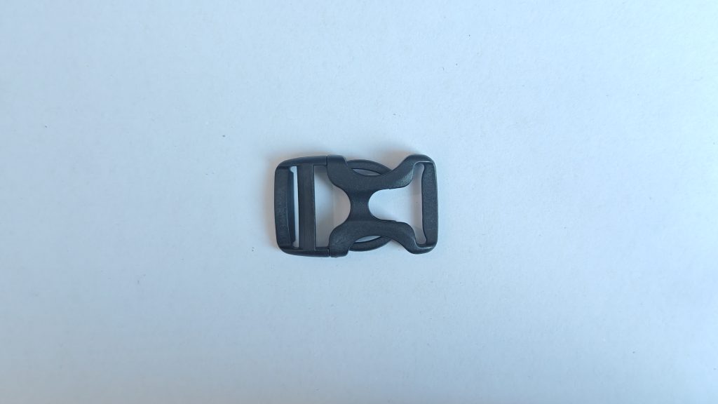 Side release buckle with hollow cross side-release structure, product photo 1