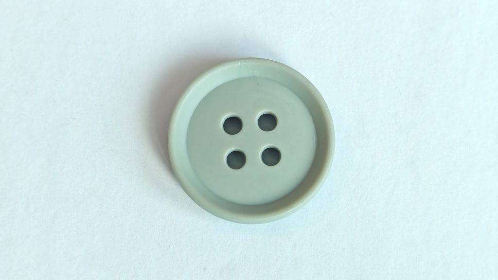 Raised-core wide-rim four-hole button product photo
