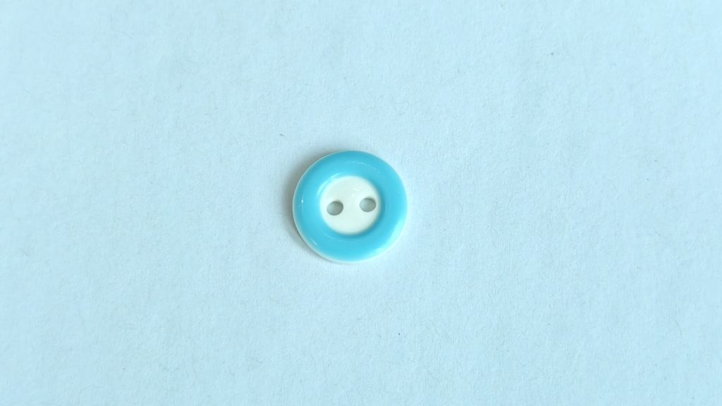 Round-edge concave two-hole button appearance image