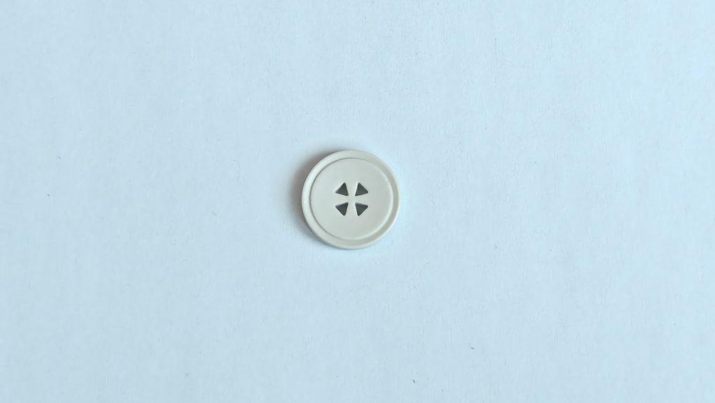 Triangle-hole four-hole button product photo