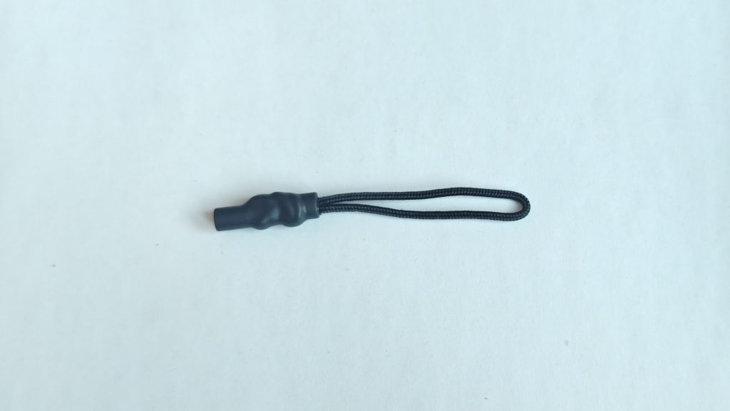 Zipper pull cord with multi-segment corrugated grip, product photo 1