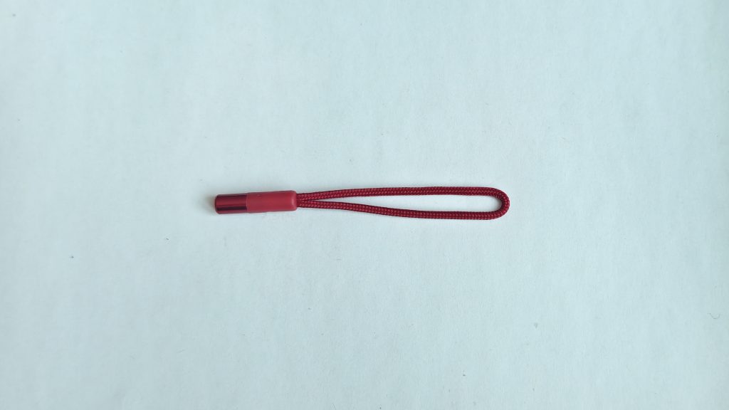 Zipper pull cord with metal end cap and sleeve grip, product photo 1