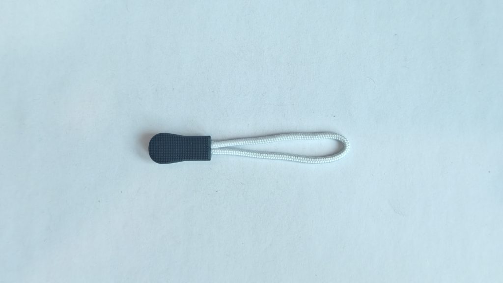 Zipper pull cord, round-head fine-textured grip, actual product photo 1